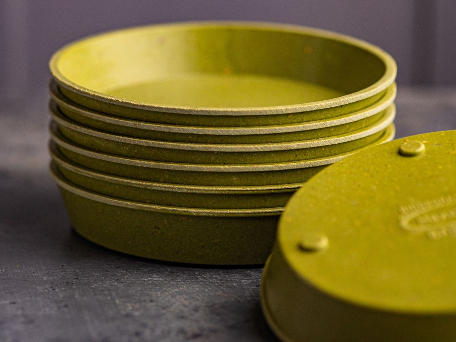 Stack of reusable bamboo trays for growing microgreens