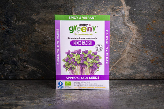 Teeny Greeny organic Mixed Radish microgreen seed packet standing upright on dark slate background