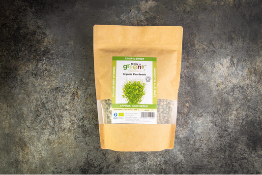 Teeny Greeny organic pea microgreen seed bag flat lay on stone surface
